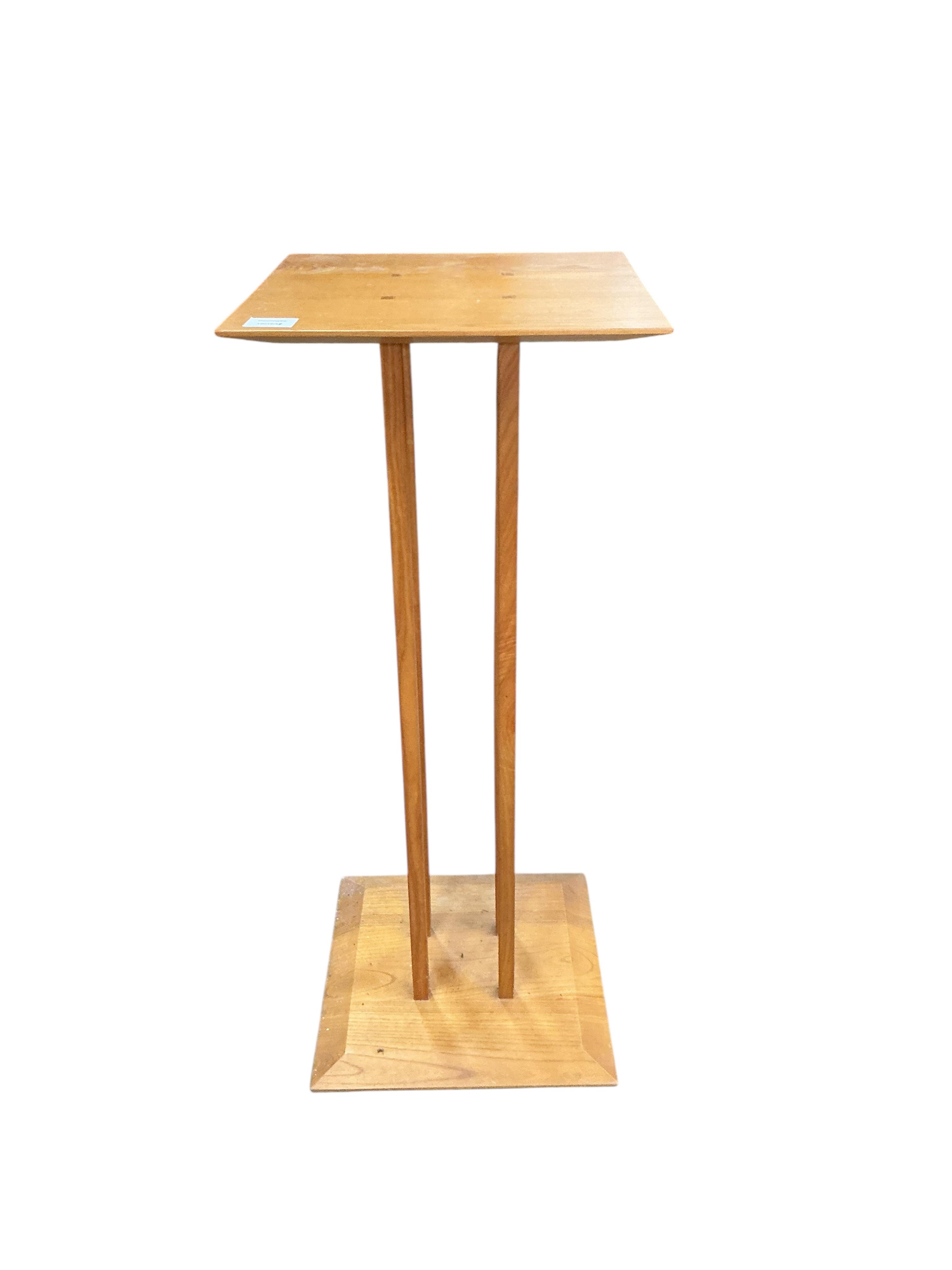 A Contemporary square topped cherry stand, by Heals, width 37cm, depth 37cm, height 90cm